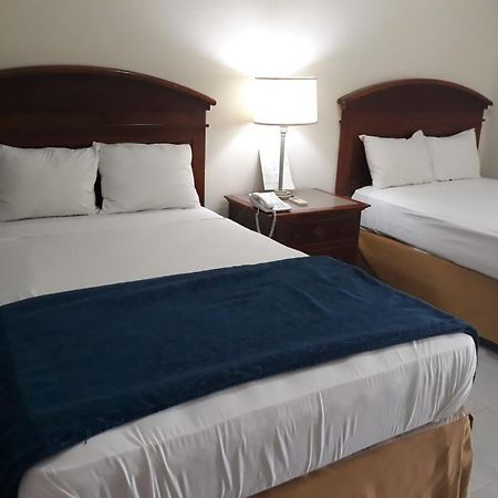 Hotel Novus Caoba Esperanza Bagian luar foto